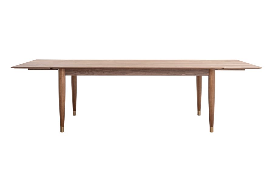 Product photography of a wooden extending dining table.