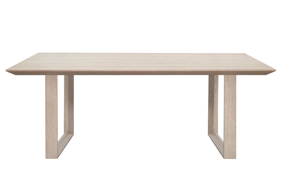 Product photography of an oak dining table.